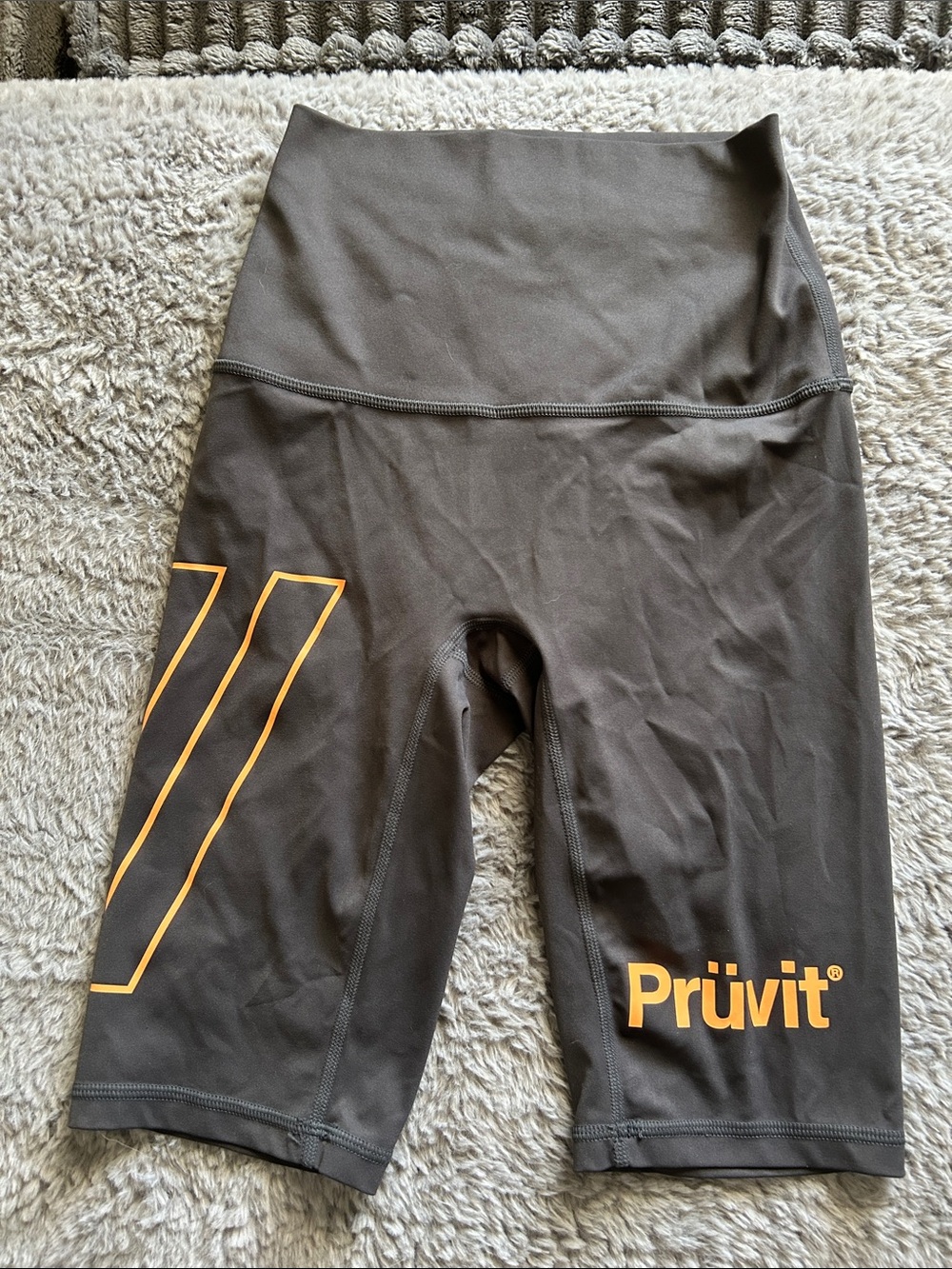 Prüvit Women's High-Rise Black Bike Shorts with Orange Logo